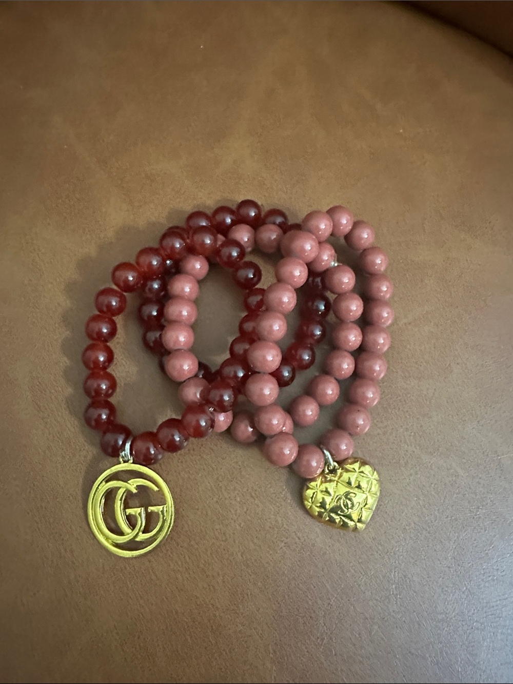 Gucci Pink and Burgundy Beaded Bracelet Set with Gold-Tone Charms